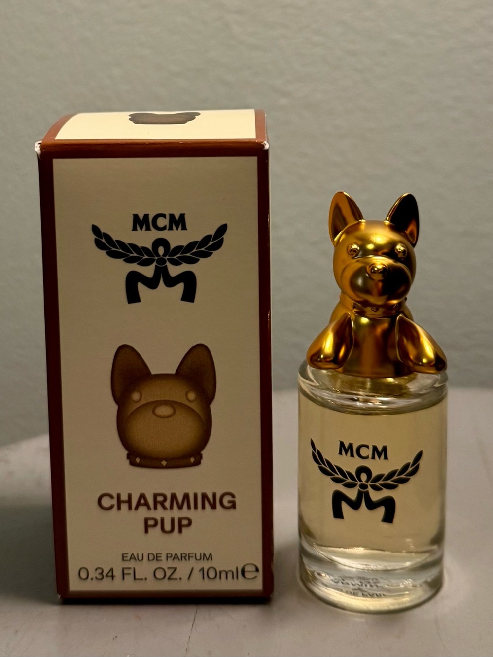 Charming pup mini glass bottle with gold pup cap